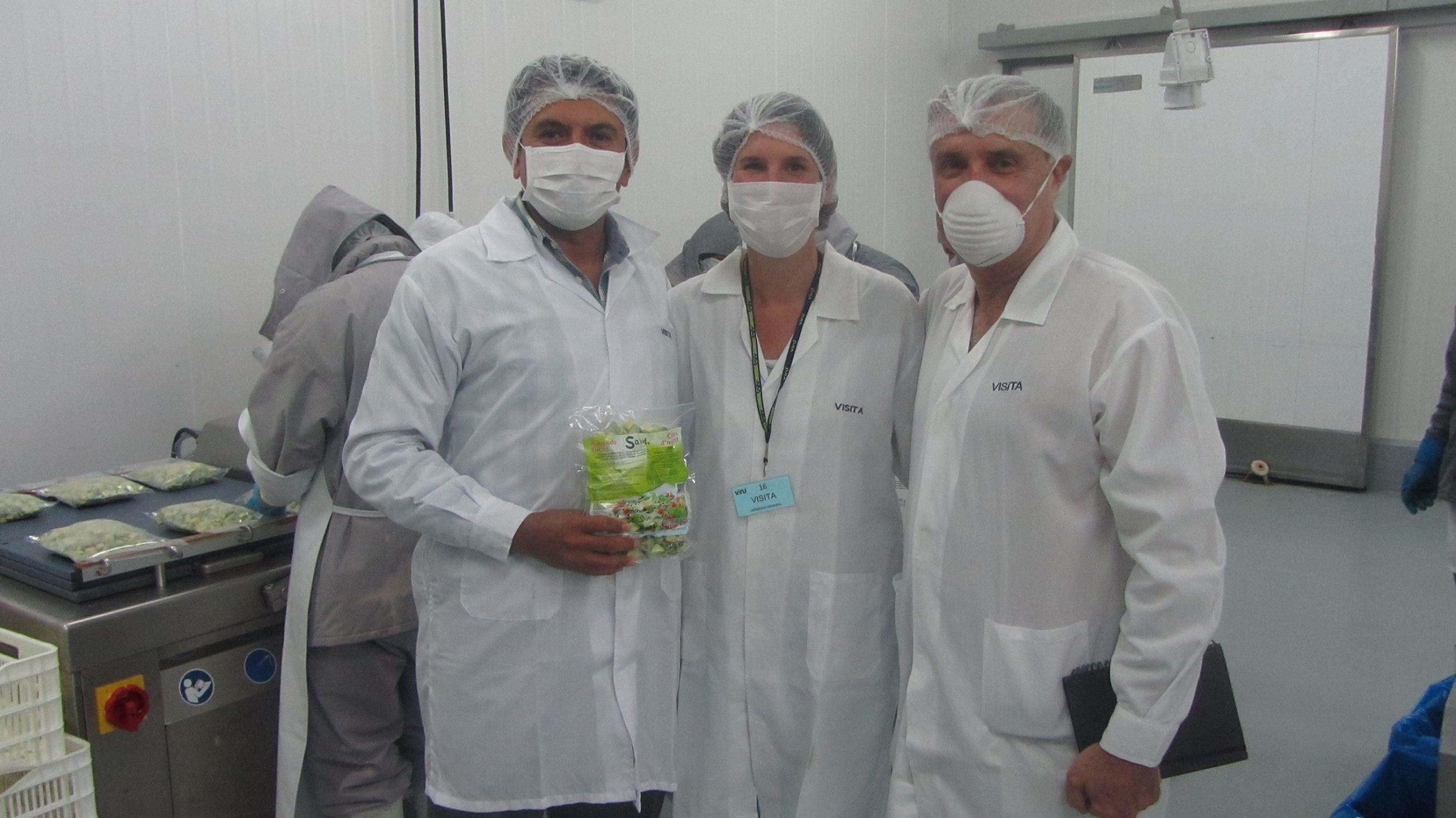 Pedro and Annette in production facility